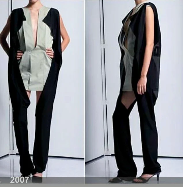 Front and side views of a loose black and pale green garment.